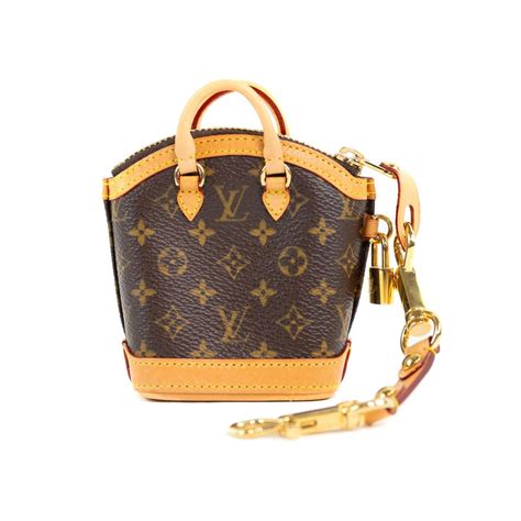 Second Hand Louis Vuitton Lockit Bags .